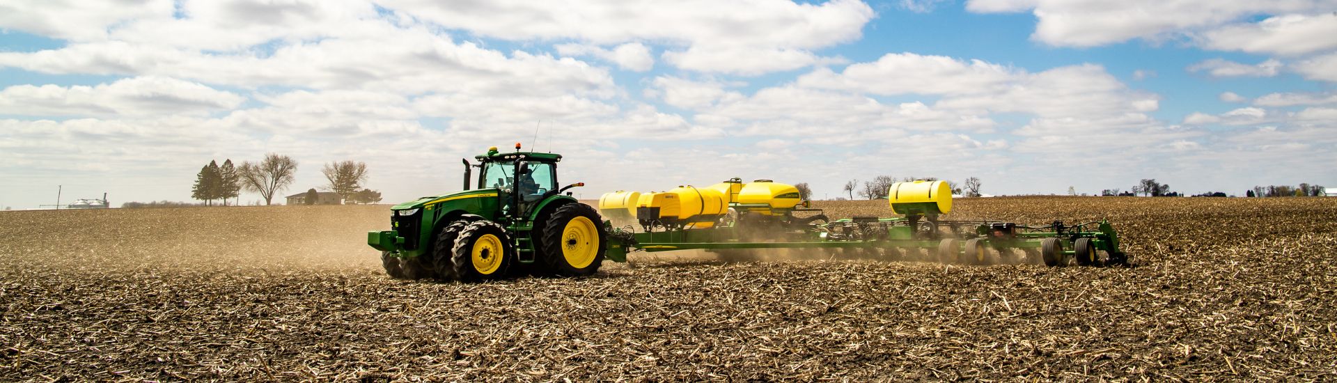 A tractor planting